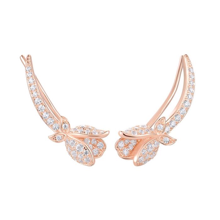 Liljedrøm Sølv øredobber med slank og buet form - sølv smykke med rosé forgylling og hvite cubic zirkonia. Naturinspirerte sølv øredobber som utstråler renhet og sofistikert stil.